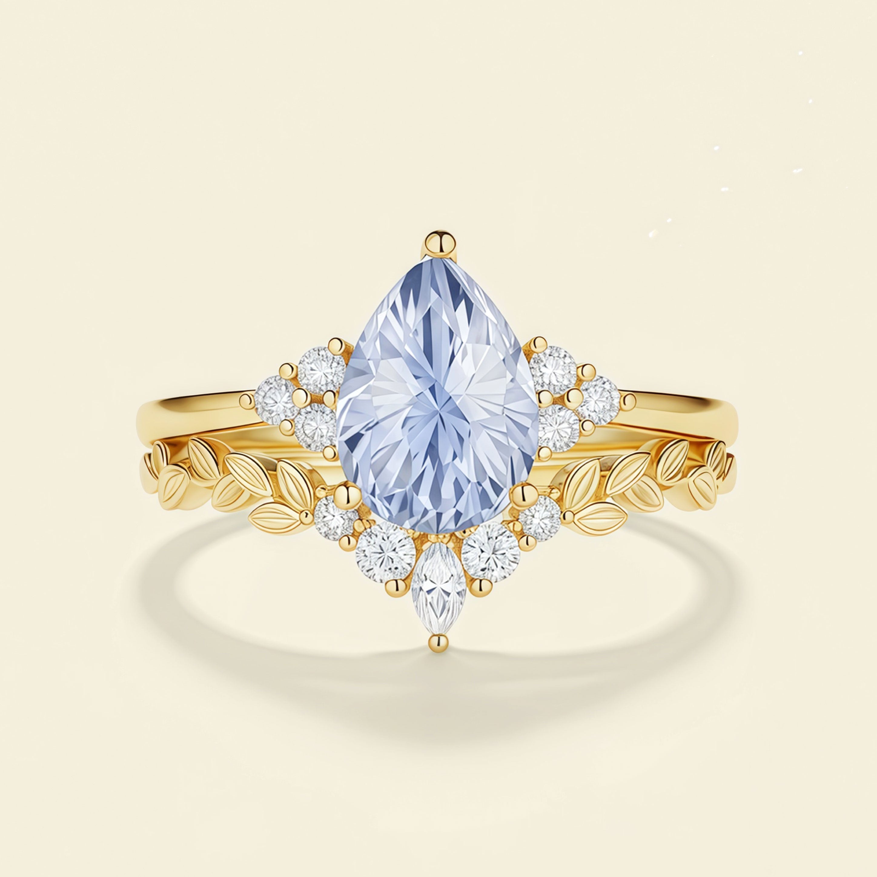Lunaria – Pear Cut Lab Cornflower Blue Sapphire Leaf Band Engagement Ring