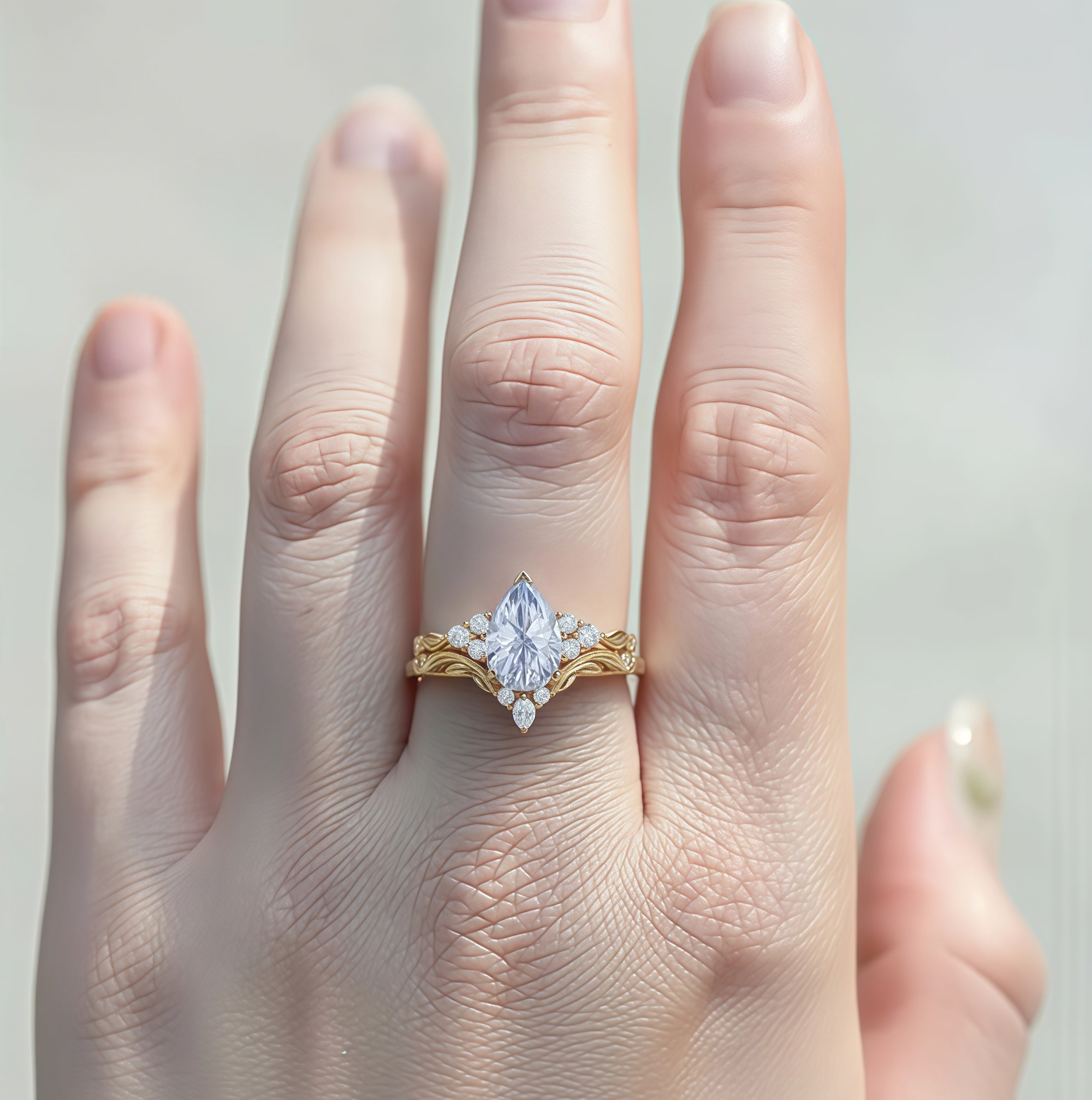 Sylvara- Pear Cut Lab Cornflower Blue Sapphire Leaf Crown Engagement Ring