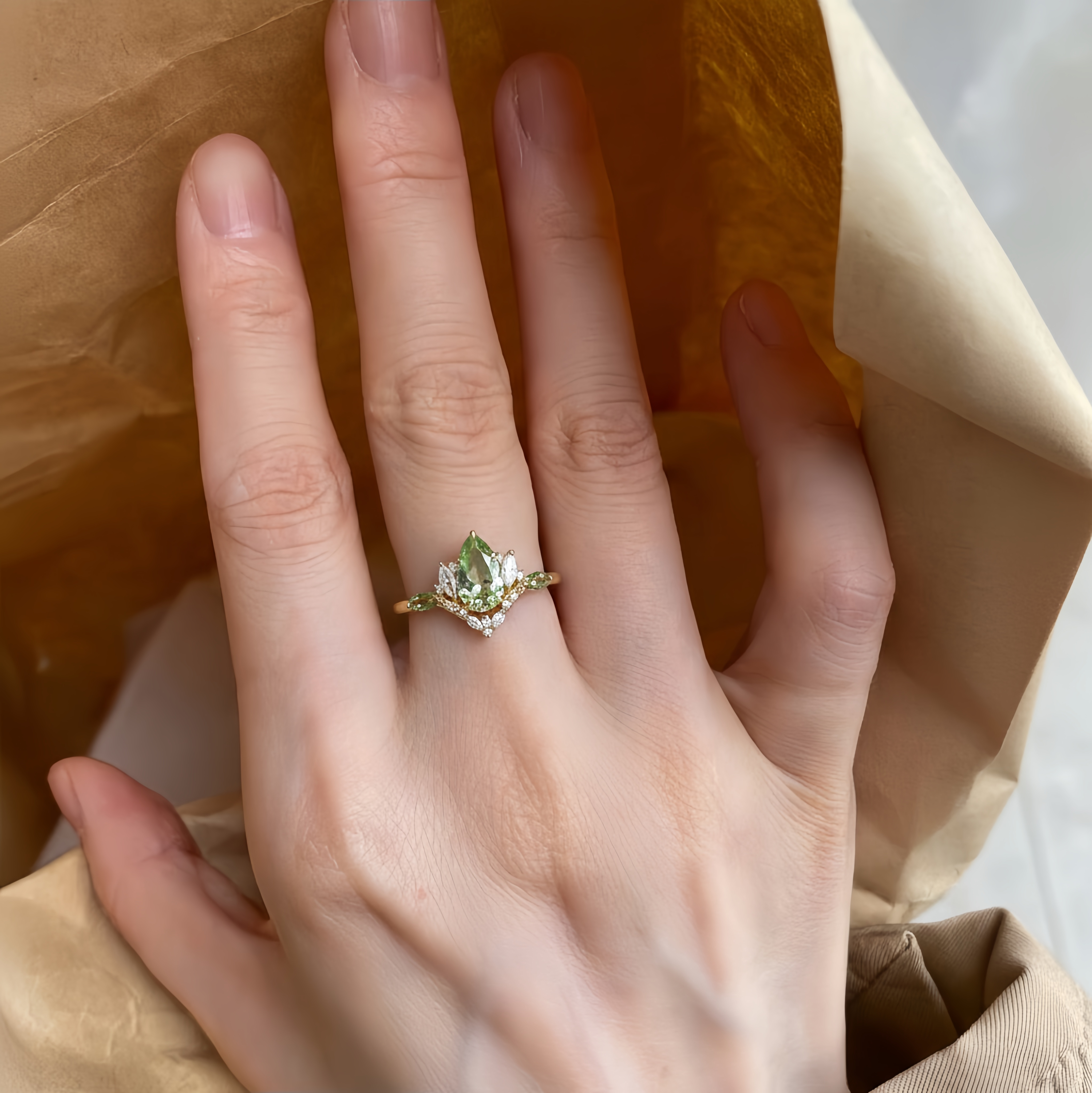 Flourish – Pear-Cut Green Moissanite & Moissanite Floral Ring