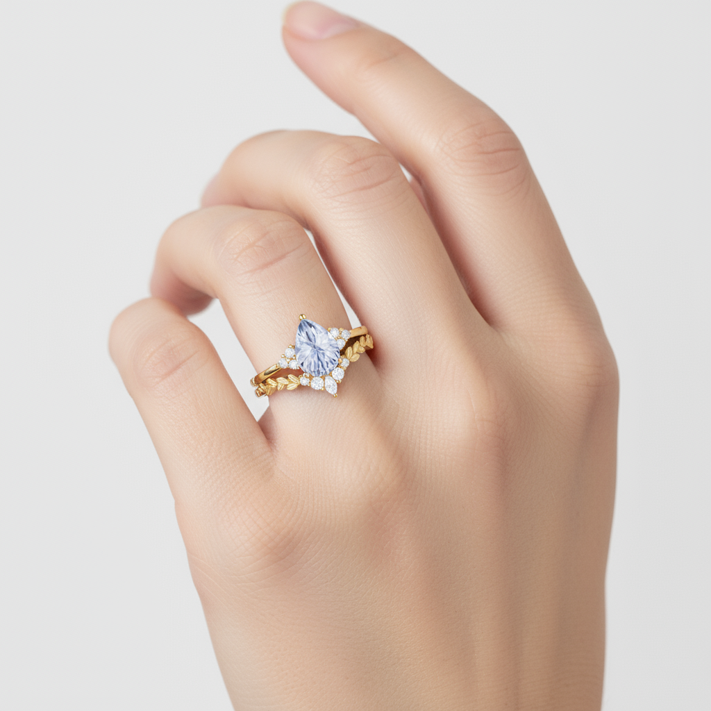 Lunaria – Pear Cut Lab Cornflower Blue Sapphire Leaf Band Engagement Ring