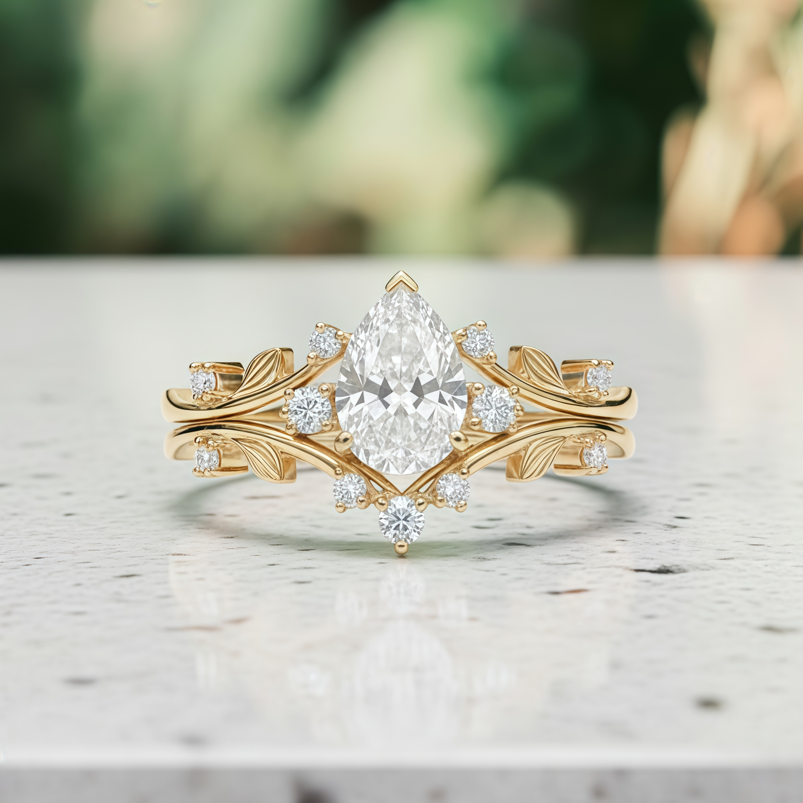 Golden Leaf Crown – Pear Cut Diamond Ring with Nature-Inspired Band